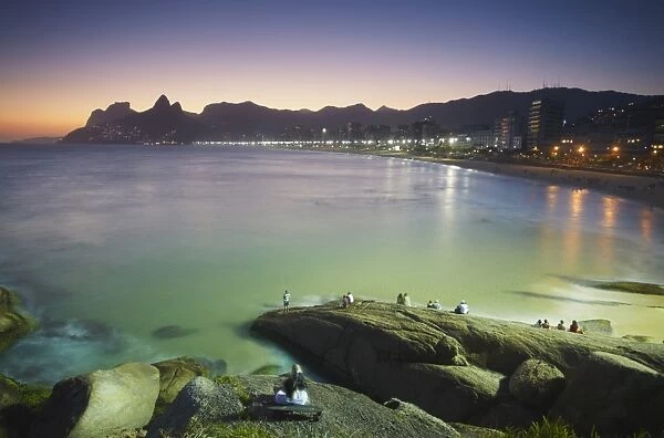 View of Ipanema beach at sunset from Ponta do Arpoador, Ipanema, Rio de Janeiro, Brazil, South America