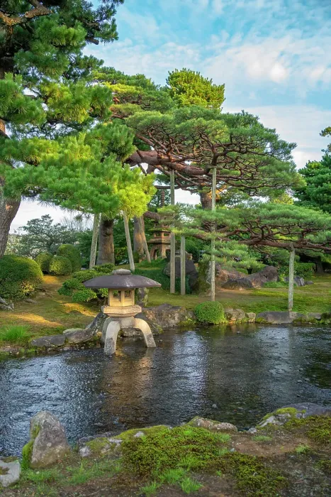 Framed Print : View of Japanese stone lantern and pagoda in Kenrokumachi Japanese Garden, Kanazawa City, Ishikawa Prefecture, Honshu, Japan Framed Print : View of Japanese stone lantern and pagoda in Kenrokumachi Japanese Garden, Kanazawa City, Ishikawa Prefecture, Honshu, Japan