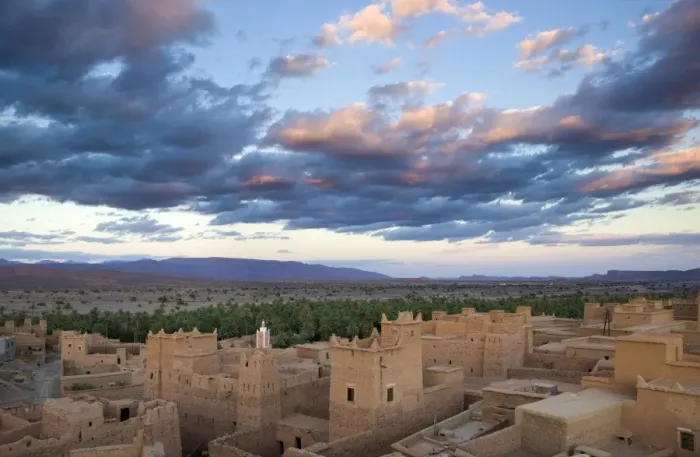Framed Print : View over kasbahs (fortified houses) to flat desert plains and Jbel Sarhro Mountains Framed Print : View over kasbahs (fortified houses) to flat desert plains and Jbel Sarhro Mountains