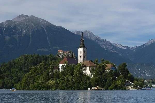 A view from above of Lake Bled and the Assumption of Mary Pilgrimage Church, Slovenia