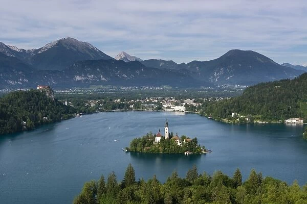 A view from above of Lake Bled and the Assumption of Mary Pilgrimage Church, Bled