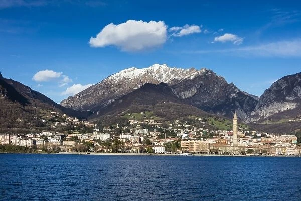 View of Lake Como and the city of Lecco framed by snowy peaks, Italian Lakes, Lombardy