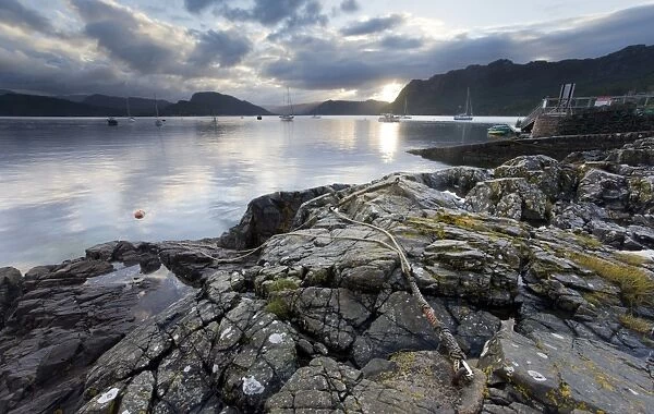 View over Loch Carron at dawn from rocks near the harbour, Plockton, Kintail