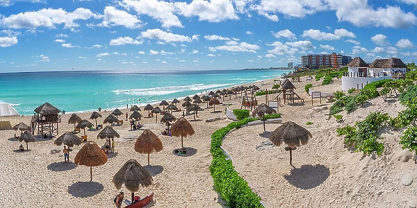View of long white sandy beach at Playa Delfines, Hotel Zone, Cancun, Caribbean Coast, Yucatan Peninsula, Mexico, North America