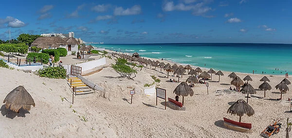 View of long white sandy beach at Playa Delfines, Hotel Zone, Cancun, Caribbean Coast, Yucatan Peninsula, Mexico, North America