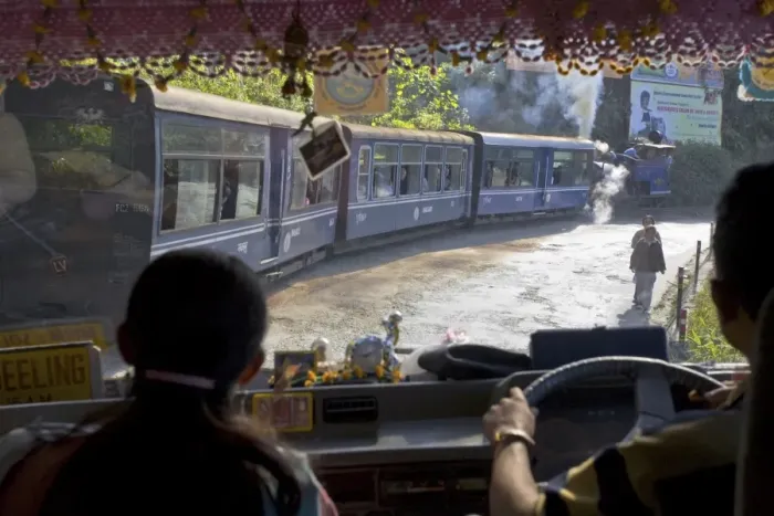 Framed Print : View looking through windscreen of bus at Steam train (Toy Train), Darjeeling Framed Print : View looking through windscreen of bus at Steam train (Toy Train), Darjeeling