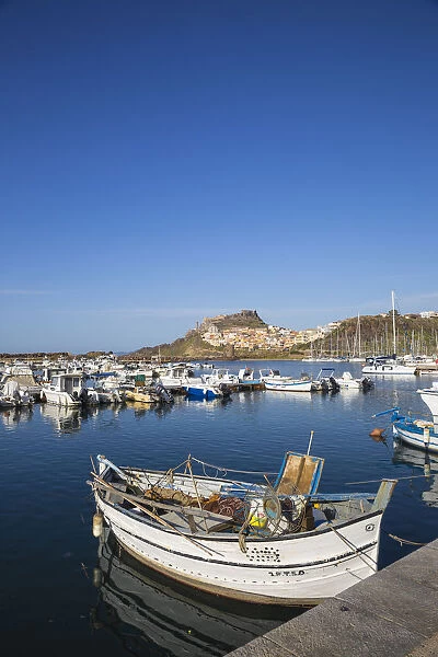 View over marina towards ancient castle, Castelsardo, Sassari Province, Sardinia, Italy