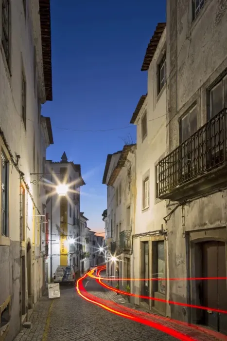 Framed Print : View along the medieval cobbled street of Rua dos Mercadores historic centre of Evora Framed Print : View along the medieval cobbled street of Rua dos Mercadores historic centre of Evora