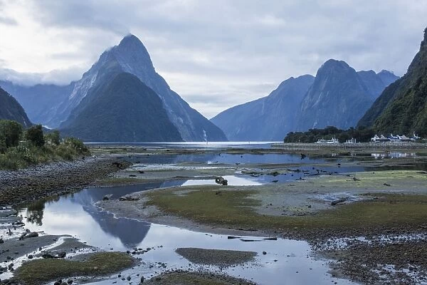 View of Milford Sound at low tide, Mitre Peak reflected in pool, Milford Sound, Fiordland