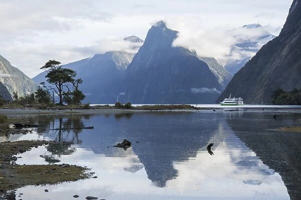 View down Milford Sound, mountains reflected in water, Milford Sound, Fiordland National Park