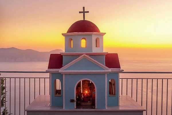 View of miniature Greek Orthodox church on coastal road near Assos, Kefalonia, Ionian Islands, Greek Islands, Greece, Europe