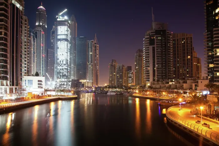 Framed Print : View of modern skyscrapers at night in Dubai Marina in Dubai, United Arab Emirates Framed Print : View of modern skyscrapers at night in Dubai Marina in Dubai, United Arab Emirates