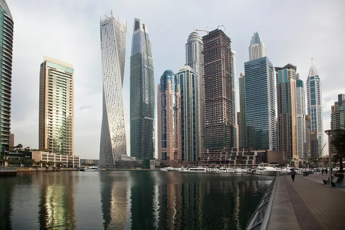 Framed Print : View of modern skyscrapers shining in sunrise lights in Dubai Marina in Dubai, United Arab Emirates Framed Print : View of modern skyscrapers shining in sunrise lights in Dubai Marina in Dubai, United Arab Emirates