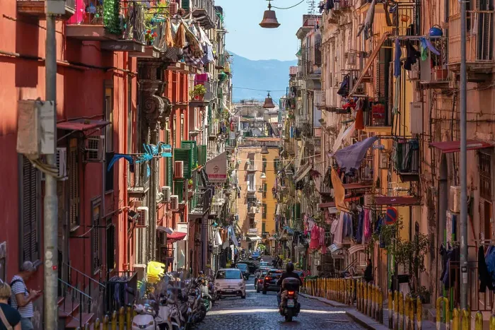 Framed Print : View of motocyclists and architecture on Via Francesco Girardi, Naples, Campania, Italy, Europe