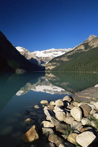 View to Mount Victoria across the emerald waters of Lake Louise, in summer