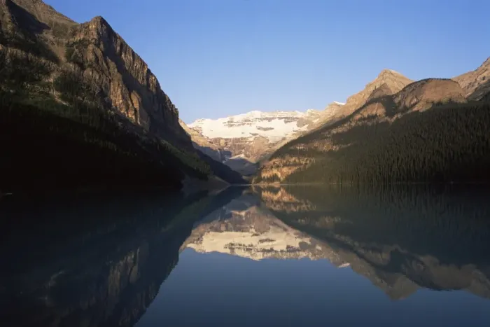 Framed Print : View to Mount Victoria across the still waters of Lake Louise, at sunrise in summer Framed Print : View to Mount Victoria across the still waters of Lake Louise, at sunrise in summer