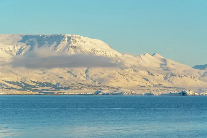 Framed Print : View of mountainous coastline North of the city seen from Reykjavik in winter, Reykjavik, Iceland Framed Print : View of mountainous coastline North of the city seen from Reykjavik in winter, Reykjavik, Iceland