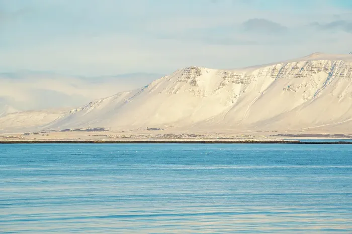 Framed Print : View of mountainous coastline North of the city seen from Reykjavik in winter, Reykjavik, Iceland Framed Print : View of mountainous coastline North of the city seen from Reykjavik in winter, Reykjavik, Iceland