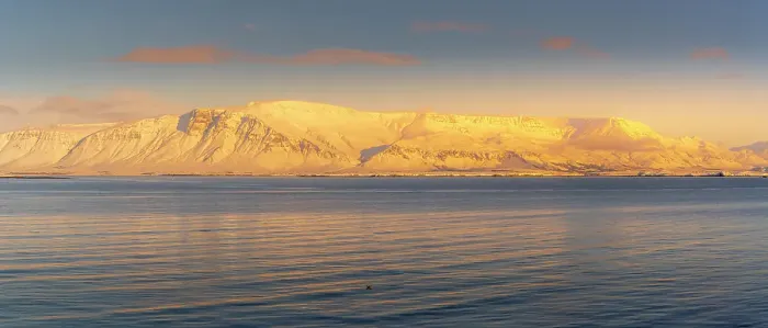 Framed Print : View of mountainous coastline North of the city seen from Reykjavik in winter, Reykjavik, Iceland Framed Print : View of mountainous coastline North of the city seen from Reykjavik in winter, Reykjavik, Iceland