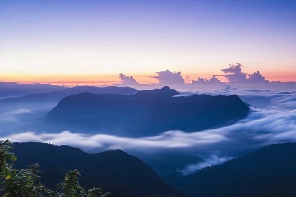 View of mountains from the 2443m summit of Adams Peak (Sri Pada) at sunrise, Central Highlands, Sri Lanka, Asia
