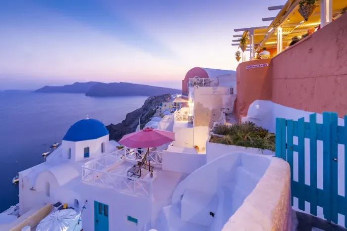 Framed Print : View of Oia village at dusk, Santorini, Aegean Island, Cyclades Island, Greek Islands Framed Print : View of Oia village at dusk, Santorini, Aegean Island, Cyclades Island, Greek Islands