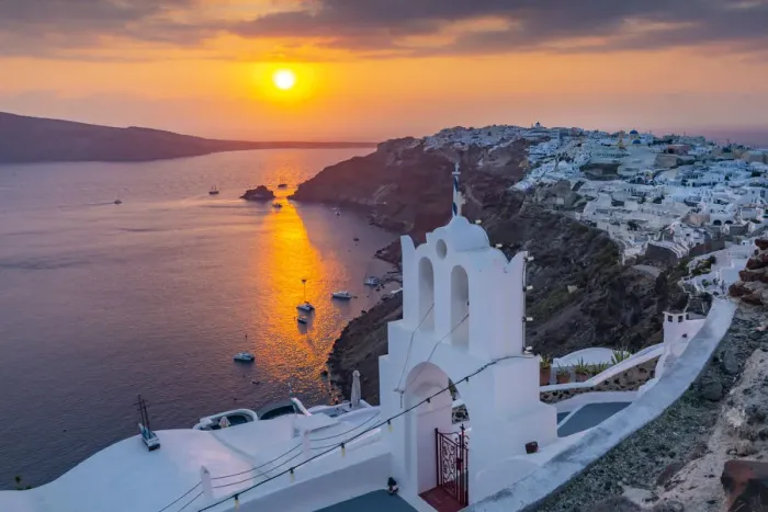 Framed Print : View of Oia village at sunset, Santorini, Aegean Island, Cyclades Island, Greek Islands Framed Print : View of Oia village at sunset, Santorini, Aegean Island, Cyclades Island, Greek Islands