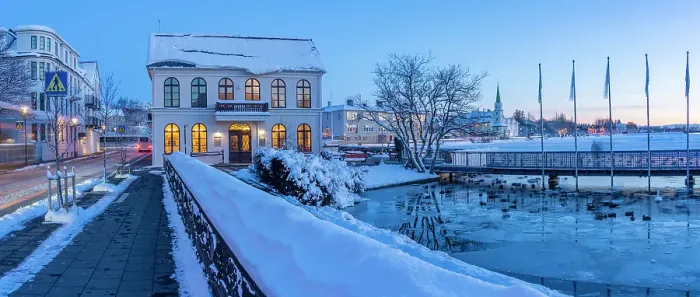 Framed Print : View of ornate buildings of Reykjavik from Tjornin lake at dusk in winter, Reykjavik, Iceland Framed Print : View of ornate buildings of Reykjavik from Tjornin lake at dusk in winter, Reykjavik, Iceland