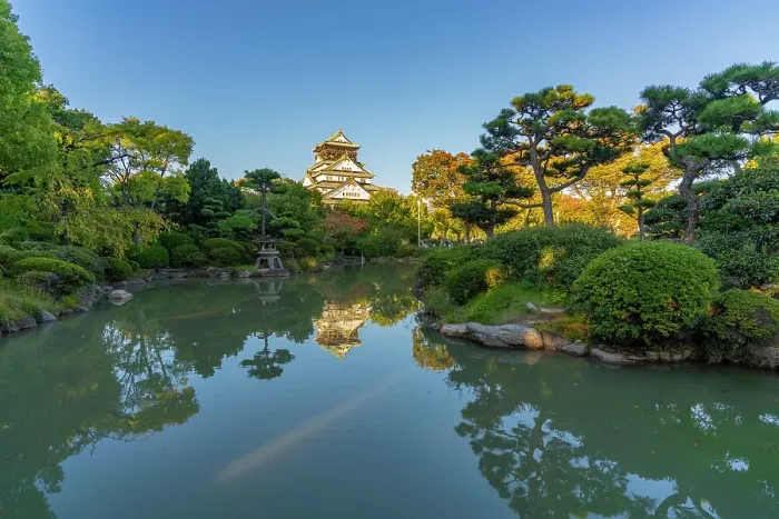 Framed Print : View of Osaka Castle (Osaka-jo) reflecting in Japanese garden pond at sunset, Chuo Ward, Osaka, Honshu, Japan