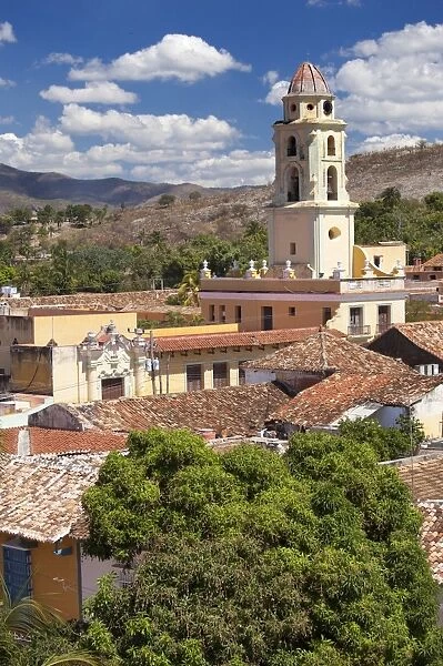View over pantiled rooftops of the town towards the belltower of The Convento de San Francisco de Asis, Trinidad, UNESCO World Heritage Site, Cuba, West Indies, Central America