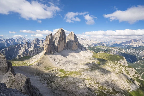 View of the Three Peaks of Lavaredo from the summit of Mount Paterno in summer. Sesto Dolomites
