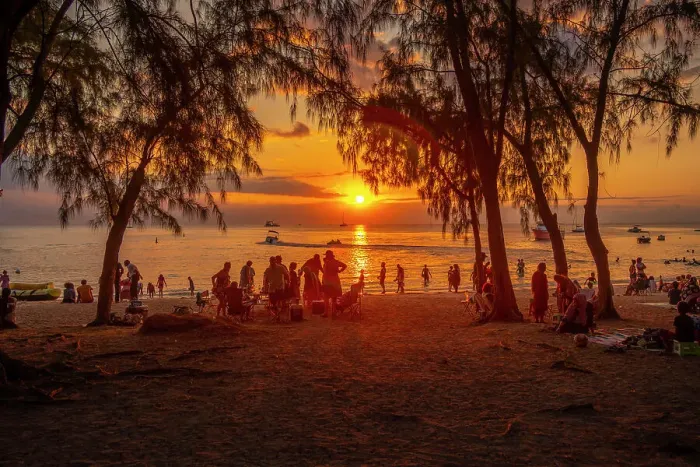 Framed Print : View of people on Mon Choisy Public Beach at sunset, Mauritius, Indian Ocean, Africa Framed Print : View of people on Mon Choisy Public Beach at sunset, Mauritius, Indian Ocean, Africa