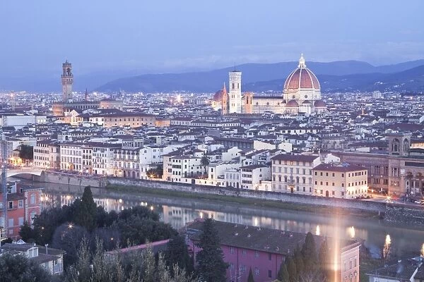 The view from Piazzale Michelangelo over to the historic city of Florence with the dome of Basilica di Santa Maria del Fiore (Duomo) lit up, Florence, UNESCO World Heritage Site, Tuscany, Italy, Europe