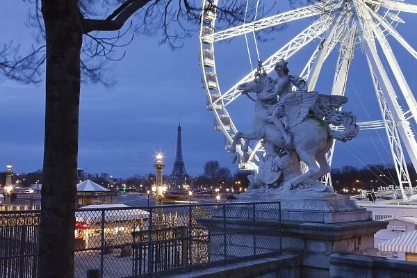 View from Place de la Concorde with big wheel and statue to the Eiffel Tower, Paris, Ile de France, France, Europe