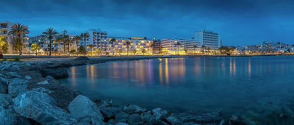 View of Platja de ses Figueretes Beach at dusk, Ibiza Town, Ibiza, Balearic Islands, Spain, Mediterranean, Europe