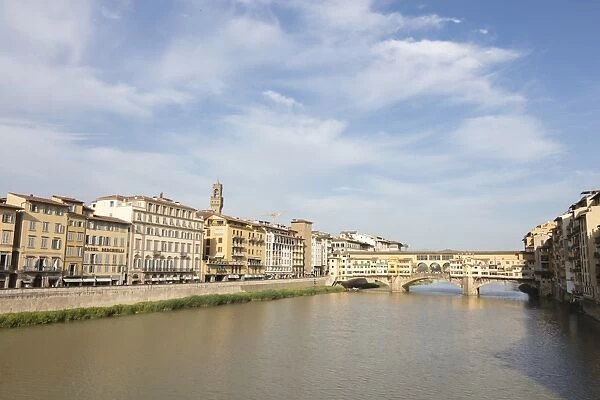 View of Ponte Vecchio, a medieval stone arch bridge on the Arno River, one of the
