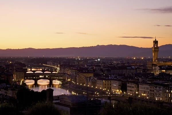 View of Ponte Vecchio, River Arno and Palazzo Vecchio in evening light from Piazzale Michelangelo