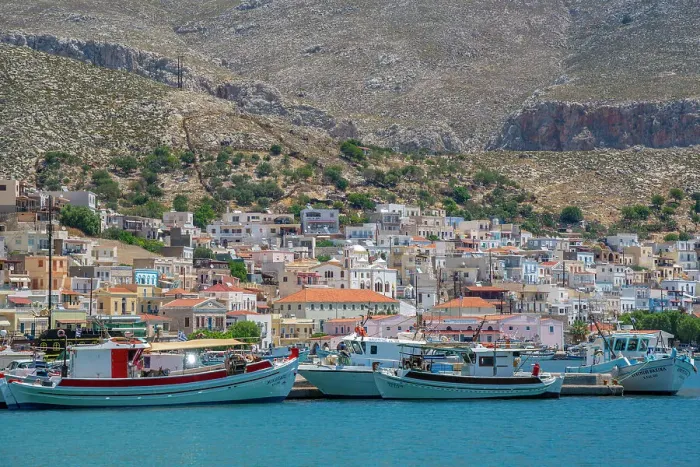 Framed Print : View of port and town of Kalimnos with hills in the background, Kalimnos, Dodecanese Islands, Greek Islands, Greece, Europe