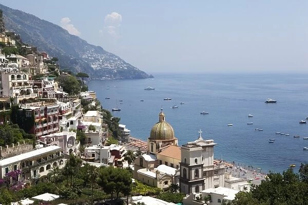 View of Positano with the typical majolica dome of Santa Maria Assunta, Costiera Amalfitana, UNESCO World Heritage Site, Campania, Italy, Europe