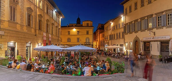 View of restaurant in Piazza San Francesco at dusk, Arezzo, Province of Arezzo, Tuscany, Italy, Europe