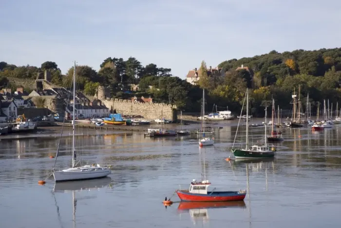 Framed Print : View across river estuary to town wall quay and harbour Framed Print : View across river estuary to town wall quay and harbour