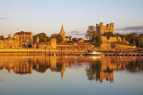 View across the River Medway to Rochester Castle and Cathedral at sunset, Rochester, Kent