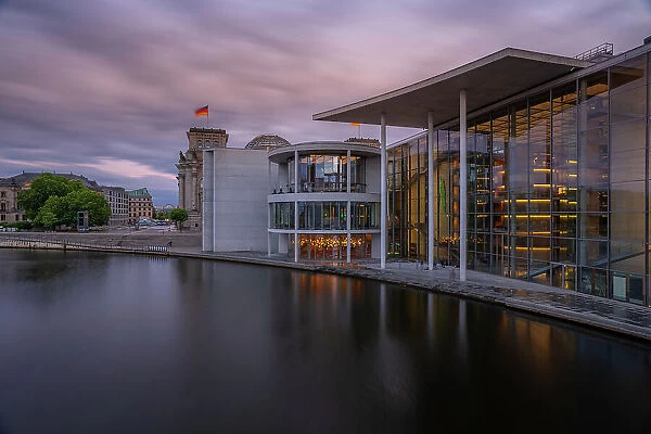 View of the River Spree, the Reichstag (German Parliament building) and Paul Loebe Building at sunset, Mitte, Berlin, Germany, Europe