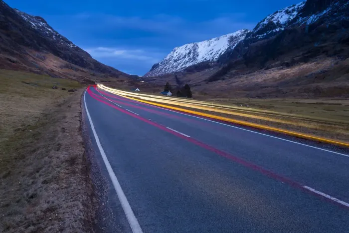 Framed Print : View of road through the Glencoe Valley at dusk, Glencoe, Highland Region, Scotland