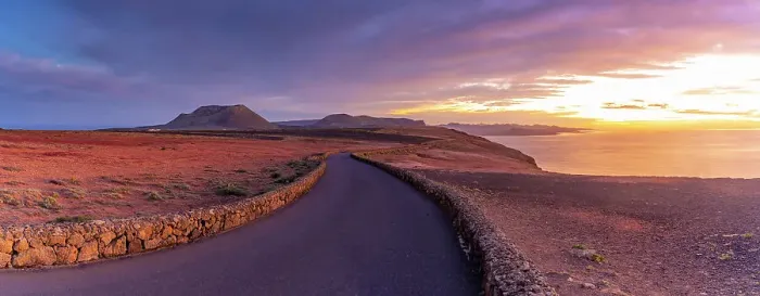 Framed Print : View of road and volcanic coastline from Mirador del Rio at sunset, Lanzarote, Las Palmas, Canary Islands, Spain, Atlantic, Europe Framed Print : View of road and volcanic coastline from Mirador del Rio at sunset, Lanzarote, Las Palmas, Canary Islands, Spain, Atlantic, Europe