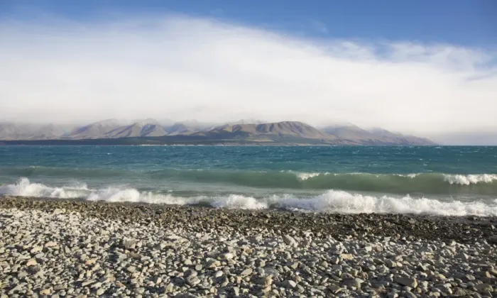 Framed Print : View from rocky shoreline across the stormy waters of Lake Pukaki, near Twizel, Mackenzie district Framed Print : View from rocky shoreline across the stormy waters of Lake Pukaki, near Twizel, Mackenzie district