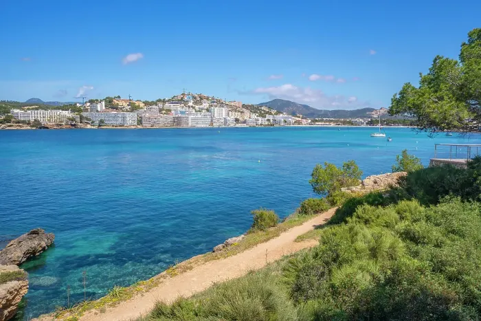 Framed Print : View of rocky shoreline by turquoise sea and Santa Ponsa, Majorca, Balearic Islands, Spain, Mediterranean, Europe Framed Print : View of rocky shoreline by turquoise sea and Santa Ponsa, Majorca, Balearic Islands, Spain, Mediterranean, Europe