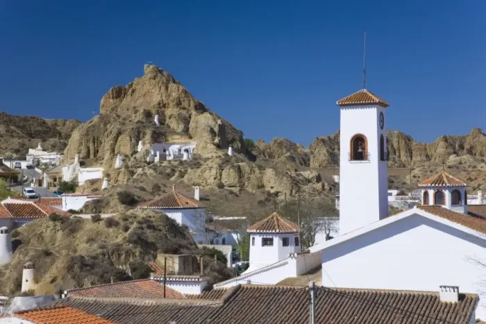 Framed Print : View across rooftops to cave houses in the troglodyte district, Guadix Framed Print : View across rooftops to cave houses in the troglodyte district, Guadix