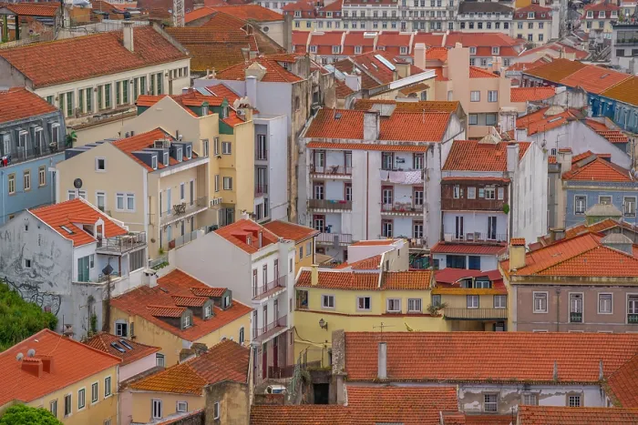 Framed Print : View of rooftops and colourful buildings from Miradouro da Senhora do Monte scenic point on a sunny day in the Alfama District, Lisbon, Portugal, Europe Framed Print : View of rooftops and colourful buildings from Miradouro da Senhora do Monte scenic point on a sunny day in the Alfama District, Lisbon, Portugal, Europe