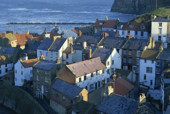 Framed Print : View over rooftops of the fishing village of Staithes, North Yorkshire coast Framed Print : View over rooftops of the fishing village of Staithes, North Yorkshire coast