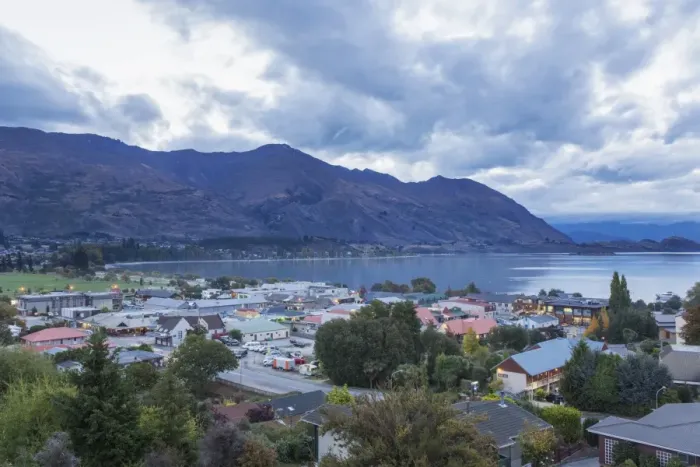 Framed Print : View over rooftops to Lake Wanaka at dusk, Wanaka, Queenstown-Lakes district, Otago Framed Print : View over rooftops to Lake Wanaka at dusk, Wanaka, Queenstown-Lakes district, Otago